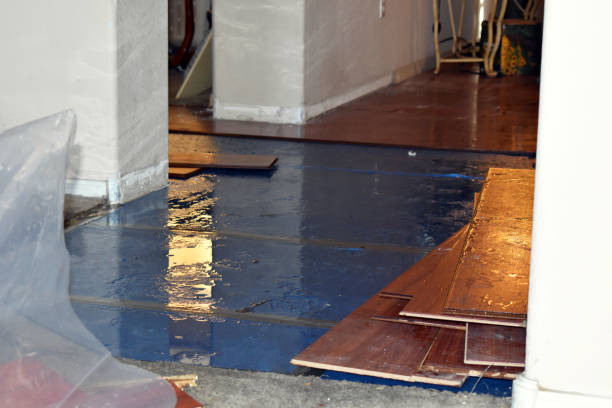 Professional Emergency Water Damage Restoration technician working in McDade, TX